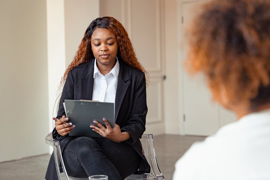 therapist working with client in Richmond office - counselor vs therapist therapist working with client in Richmond office - counselor vs therapist